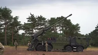 Danish troops firing CAESAR 8x8 155 mm self-propelled artillery system