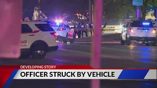 Car strikes officer in North St. Louis County; injuries non-Life-threatening