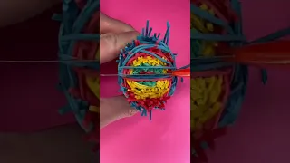 Cutting open a rubber band ball. 🧶 #rubberband #rubberbandball #satisfying