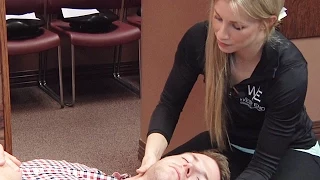 Spinal Adjustment: Back Pain Treatment at West End Chiropractic (Female Doctor, Male Patient)