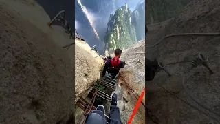 Walk the thrilling iron path on Mount Huashan cliffside