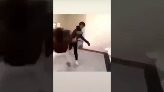 kid beats meat to 2 young chocolate men having an intense wrestling match