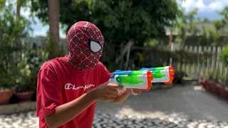 SPIDER MAN Attack BAD GUYS - Mansion Battle | Người Nhện Bắn Súng Nước NERF WAR