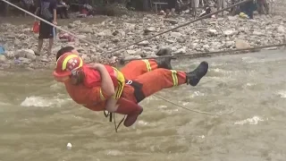 65 Residents Rescued after Rain Floods Beijing Suburb