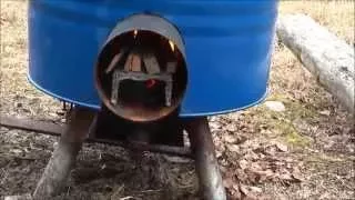 Simple DIY rocket stove producing hot water/food and charcoal