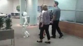 Watch Asimo take people to their table in Japan