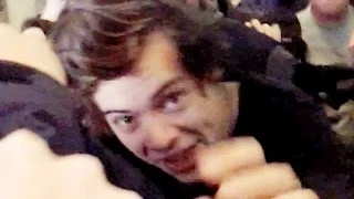 HARRY STYLES Reaches For Fan's Camera While Being Mobbed