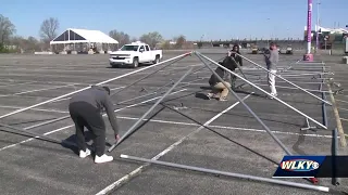 Crew work to set up largest vaccination site in Kentucky at Cardinal Stadium