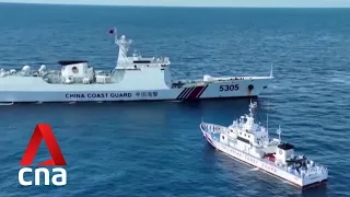 China says warning issued to Philippines after vessels entered disputed area in South China Sea