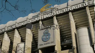 Santiago Bernabeu Stadium and Real Madrid logo in Spain