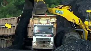 When the loader loads coal onto the trailer truck.