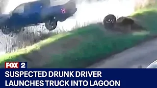 Suspected drunk driver launches truck into Michigan lagoon