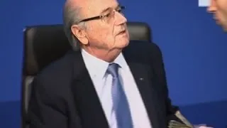 Man Throws Stack of Cash at FIFA's Sepp Blatter