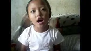 Little girl singing Nepali Anthem