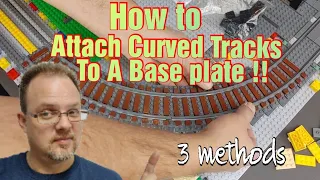 How to attach ballasted curved Lego train tracks to a baseplate.