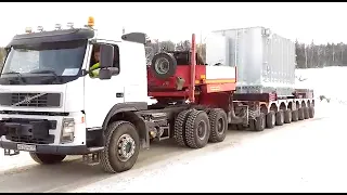 Volvo FM 6x6 push-pull tractor storms the hill. Payload 150 ton. Volvo FMX 6x6 штурмует холм.