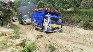 Palm Oil Truck Drivers Suffer During the Rainy Season