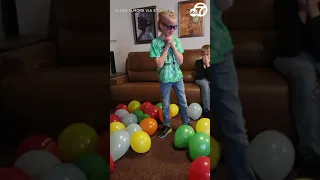 Boy gets overwhelmed by the effect of color blindness glasses