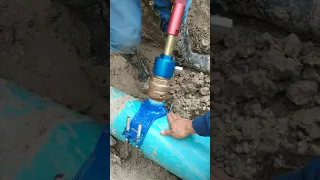 Live hot tapping in a water main