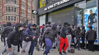 Huge queues as shops reopen in lockdown easing