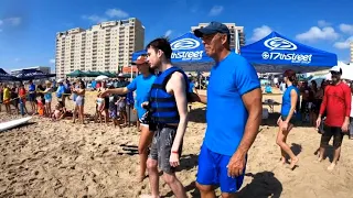 Group uses surfing as therapy for local kids with autism