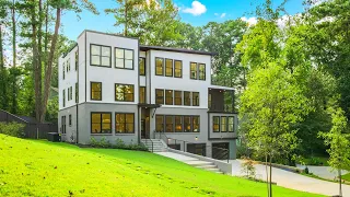 Inside a New MODERN DESIGNED 6 Bdrm, 5.5 Bath LUXURY Home W/POOL & NO HOA For Sale in ATLANTA, GA