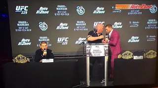 Dana white takes a shot of whiskey with Conor mcgregor