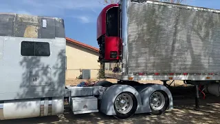 Peterbilt 379 Picking up Great Dane reefer stainless steel spread axle