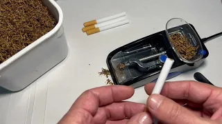 Cigarette sleeves, how to score cigarettes with an electric device. Zigaretten-Patronen.