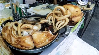 Hong Kong Food, Cooking the Cuttlefish. A Street Food Delicacy of Tai O Village