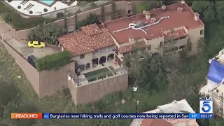 Police swarm Beverly Crest mansion occupied by squatters