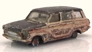 Ford Consul Cortina version with a golfer. Renovation of Corgi model no. 440.