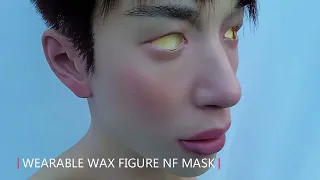 Young asian male silicone mask with hair