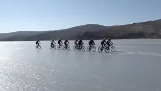 Cyclists race on frozen lake in Vladivostok