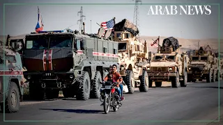 US and Russian military patrols seen on northeast Syria road