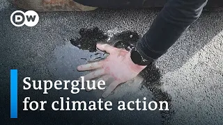 Climate activists superglue themselves to Berlin streets | DW News