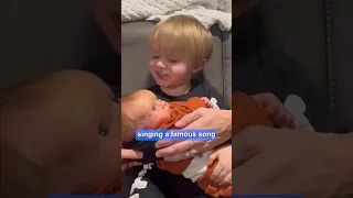 Toddler hilariously rocks little sister to sleep with famous song 😂❤️