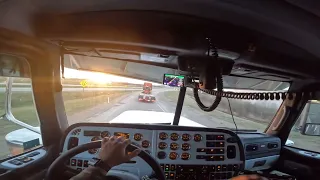 Cab View Of Peterbilt 389 And Dumping Rock Load