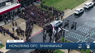 Pallbearers escort Elwood police Officer Noah Shahnavaz after funeral