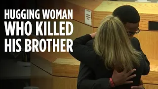 Brother of man killed by Amber Guyger hugs her after sentencing