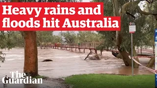 Heavy rain leaves Alice Springs flooded with Australia's eastern states on alert for wild weather