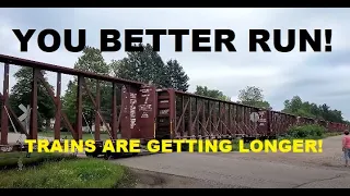 You Better Run To Beat That Train Full Of Centerbeam's! #trains #trainvideo | Jason Asselin