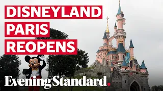 Mickey Mouse greets visitors as Disneyland Paris reopens following coronavirus lockdown