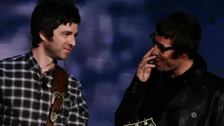 Noel and Liam Gallagher, the fork and the bottle of champagne