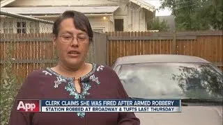 Clerk claims she was fired after armed robbery