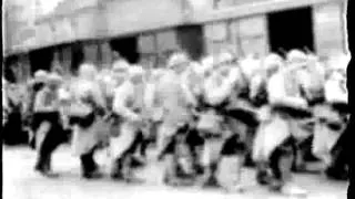 [FOX-MOVIETONE NEWSREEL EXCERPTS], Fox-Movietone - Sarajevo, crowd scene; French artillery, stre...