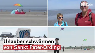 "Fast wie in Kroatien": Urlauber in Sankt Peter-Ording genießen das Sommerwetter