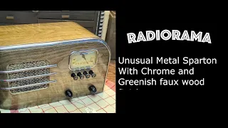 Metal cased Sparton radio with chrome and green photo finish wood