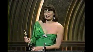 Anjelica Huston wins the Academy Award for Best Supporting Actress in Prizzi's Honor