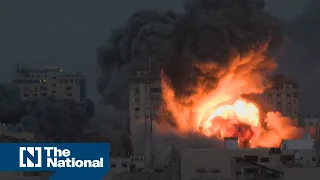 Building collapses in Gaza after Israeli air strike